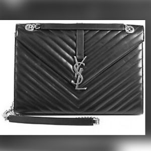 Monogram quilted Authentic Saint Laurent Handbag with gun metal hardware